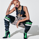 Hanes tank top. Heron Preston bikini top. L.L. Bean waders. Fenty Puma by Rihanna boots.